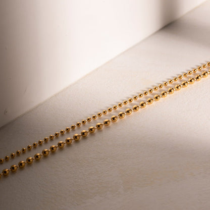 Collier en Chaîne à Boules Superposées